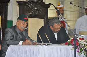 The Governor designate Brig. (Dr.) B.D. Mishra (Retd) signing oath paper in presence of Honble Chief justice of Gauhati High Court Mr. Ajit Singh in the Darbar Hall of Raj Bhavan , Itanagar on 3rd October2017.